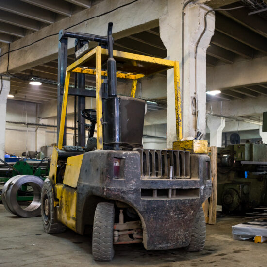 forklift parked inside an industrial hall