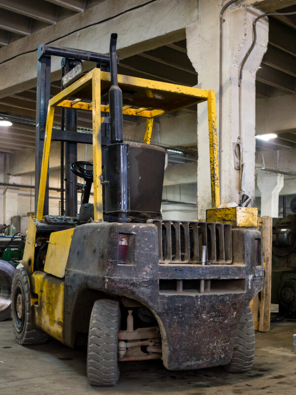 forklift parked inside an industrial hall
